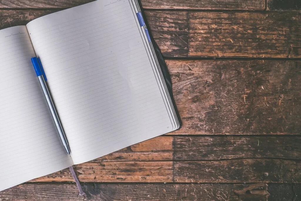 A blank notebook to use as a journal. Self-care ideas for Depression.